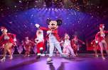 Mickey Mouse tanzt im Konfettiregen Mickey Mouse tanzt im Konfettiregen