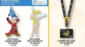 ein Pin von Mickey als Zauberer, ein Pin mit Tinkerbell und ein Pin-Lanyard mit Simba-Motiv
