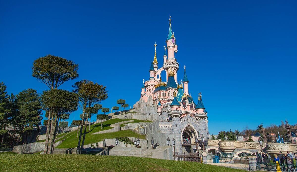 Night performances near Sleeping Beauty castle in Disneyland Paris. Disneyland  Paris (Euro Disney Resort) - entertainment resort in Marne-la-Vallee.  Marne-la-Vallee, France. March 30, 2019. Stock Photo